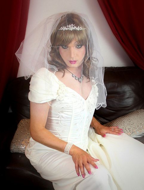 Lovely crossdresser in wedding dress