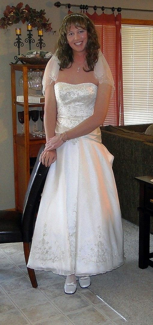 Lovely crossdresser in bridal dress