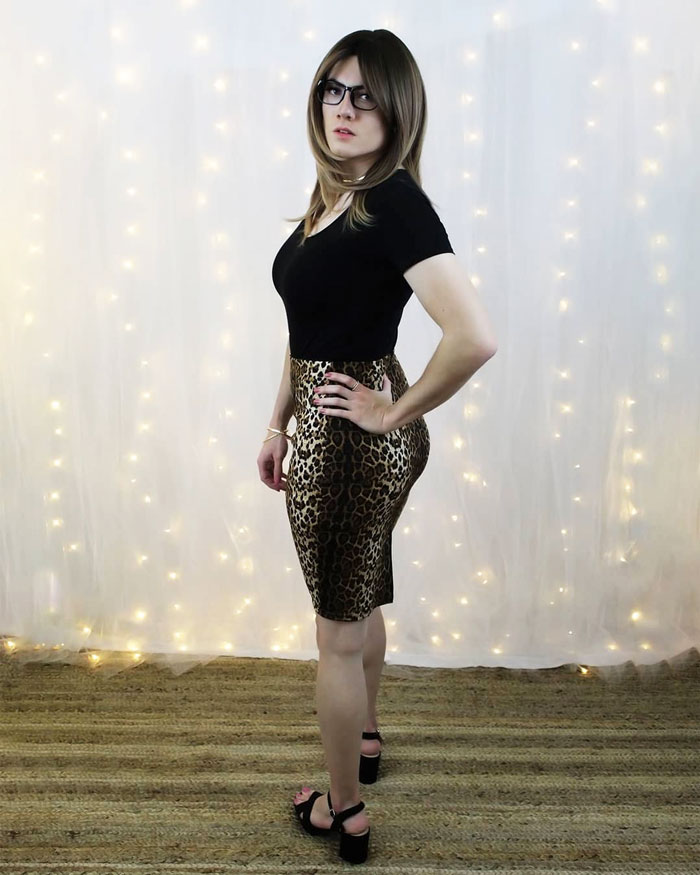 Crossdresser Natalee in leopard print skirt and heels