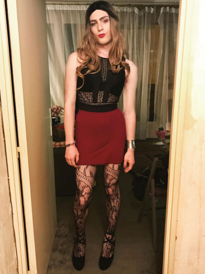 Samantha crossdressing in red skirt and heels
