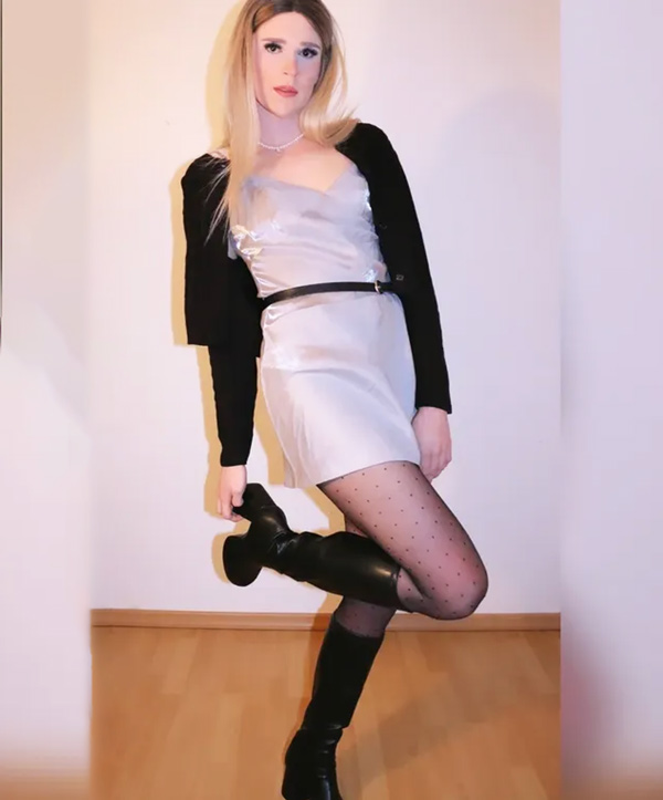 crossdresser Lisa in mini dress and boots