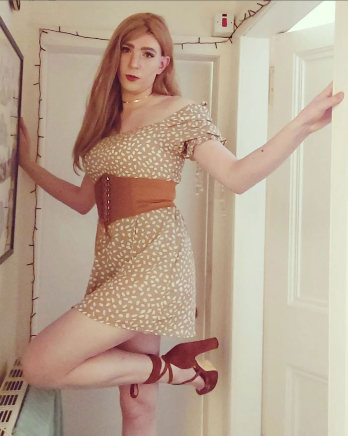 cute crossdresser in dress and heels