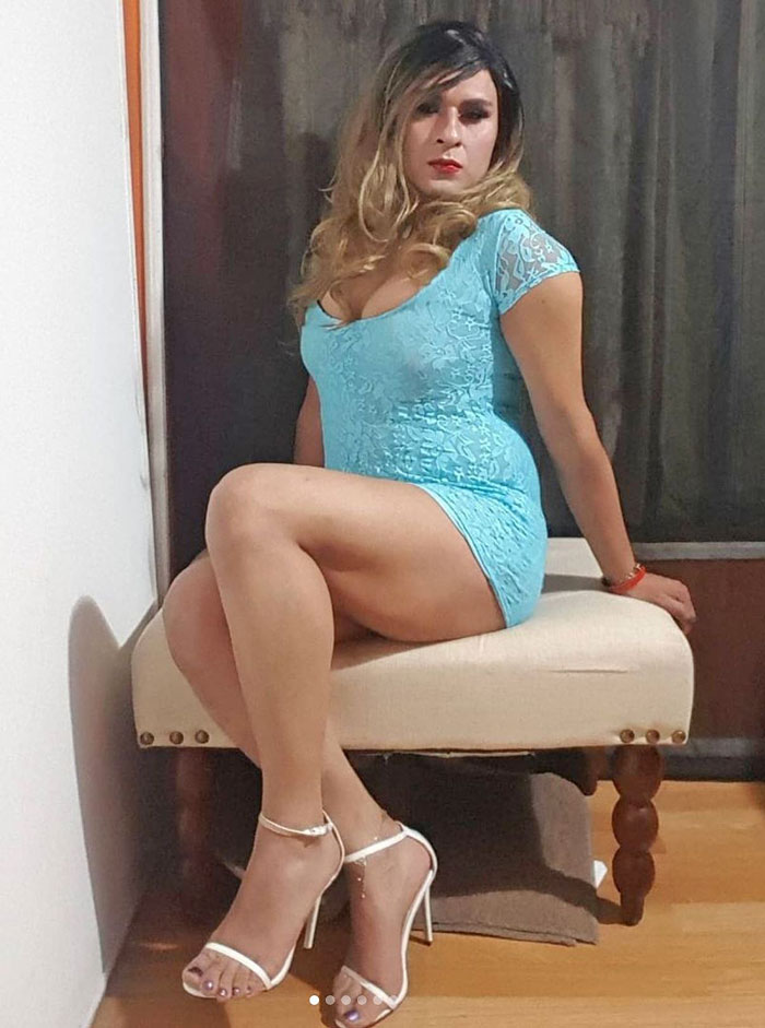 crossdresser in blue mini dress