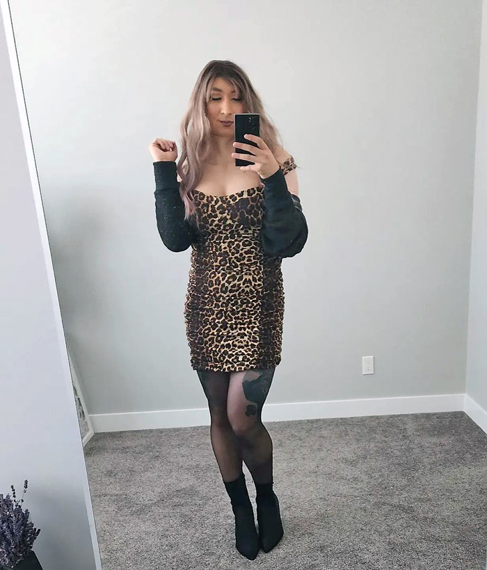 Crossdresser in leopard print dress