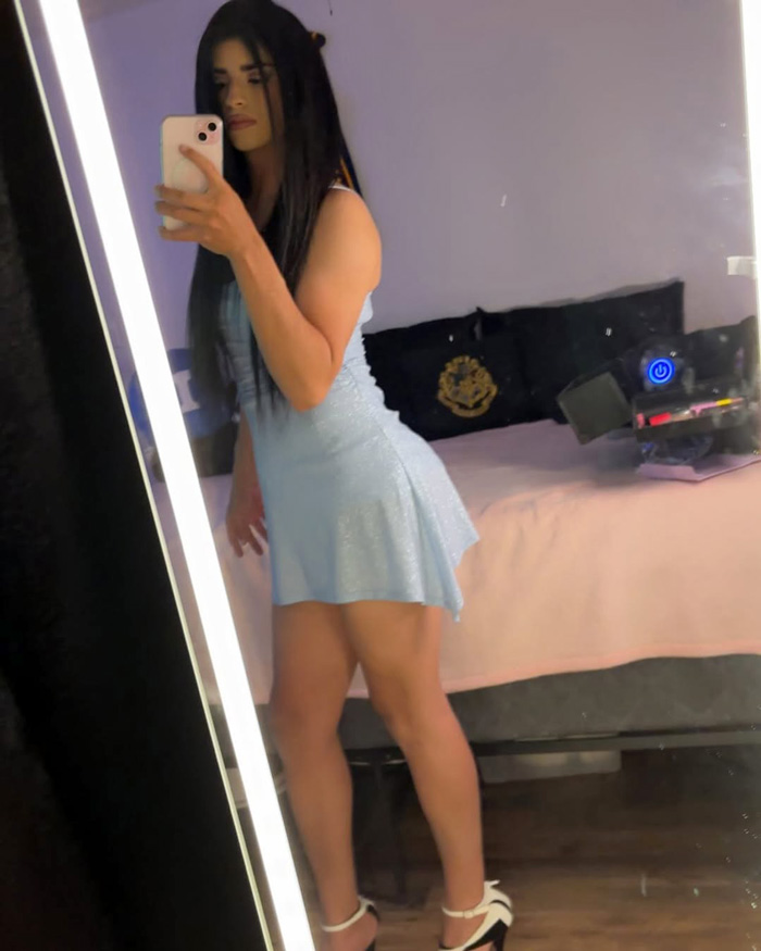 crossdresser in flare dress
