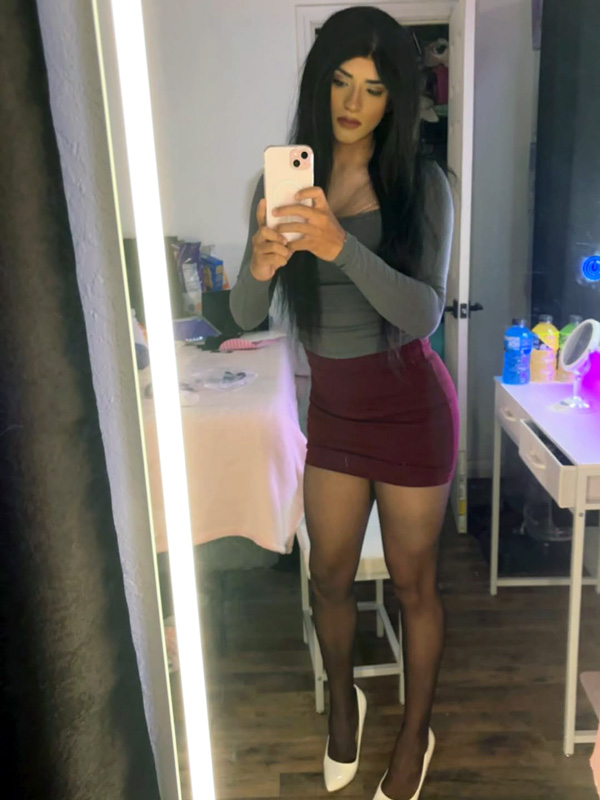 crossdresser in mini skirt and pantyhose