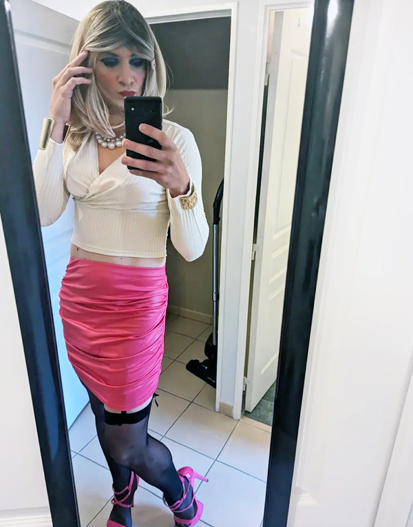 crossdresser in pink skirt