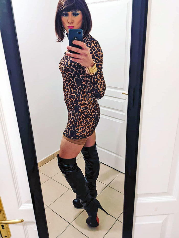 mature crossdresser in leopard dress