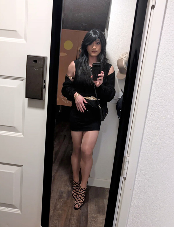 cute crossdresser in black dress