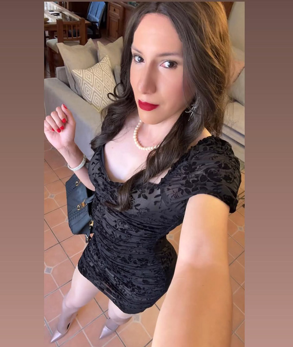 cute crossdresser in black dress and heels