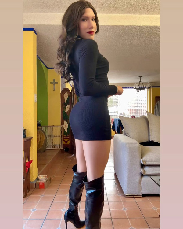 crossdressing in boots and mini skirt