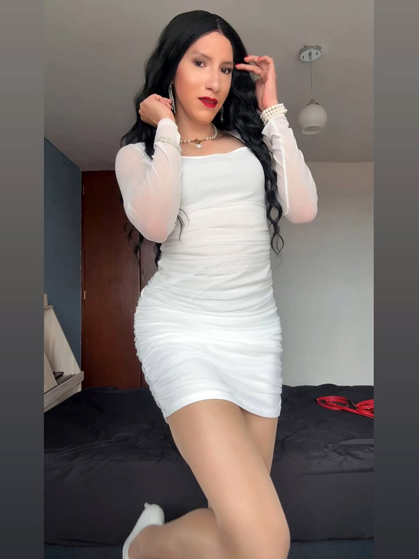 Crossdresser Helena in white mini dress