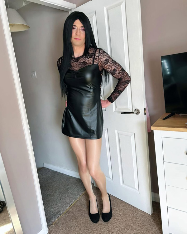 crossdresser in black dress