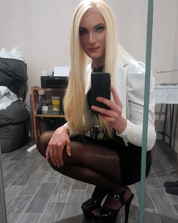 cute crossdresser in skirt and pantyhose