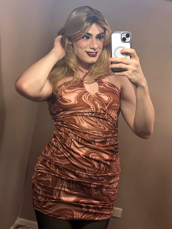 crossdresser in mini dress