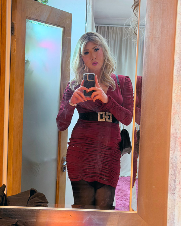 blonde crossdresser in red dress