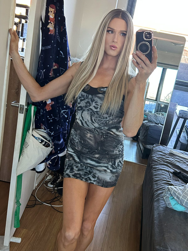beautiful crossdresser in mini dress